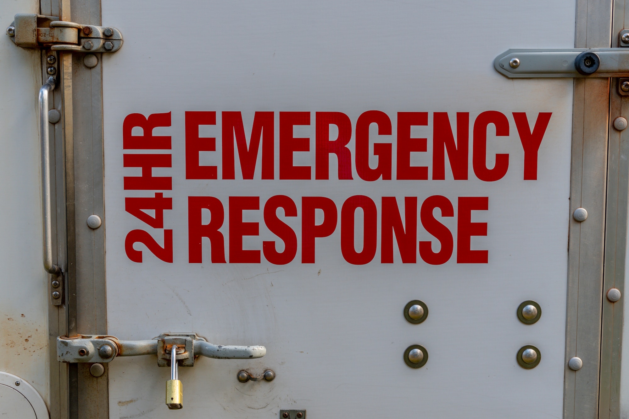 24hr Emergency Response on the side of a rescue vehicle